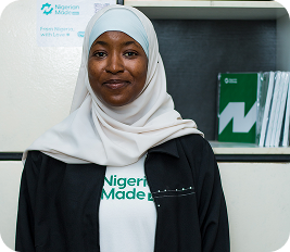 Team member in white hijab